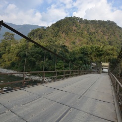 On the suspension bridge before the climb upwards to Pelling